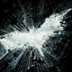 The teaser poster for The Dark Knight Rises, with the Batman symbol as formed by destroyed buildings.